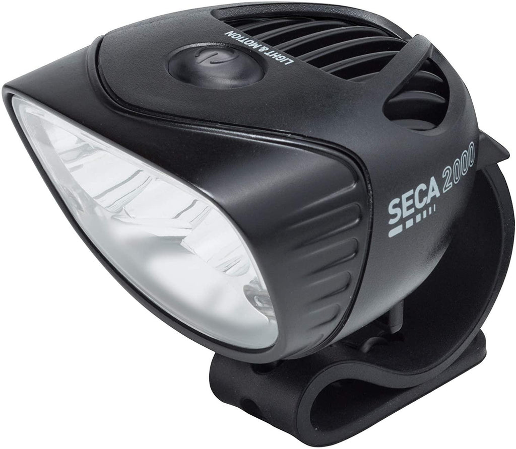 Light & Motion Seca Race 2000, Light up The Trail with 2000 lumens of Power. Patented Optics and a Combination of spot + Wide-Flood Beams Allow The Rider to Push Their Limits in Any Terrain.